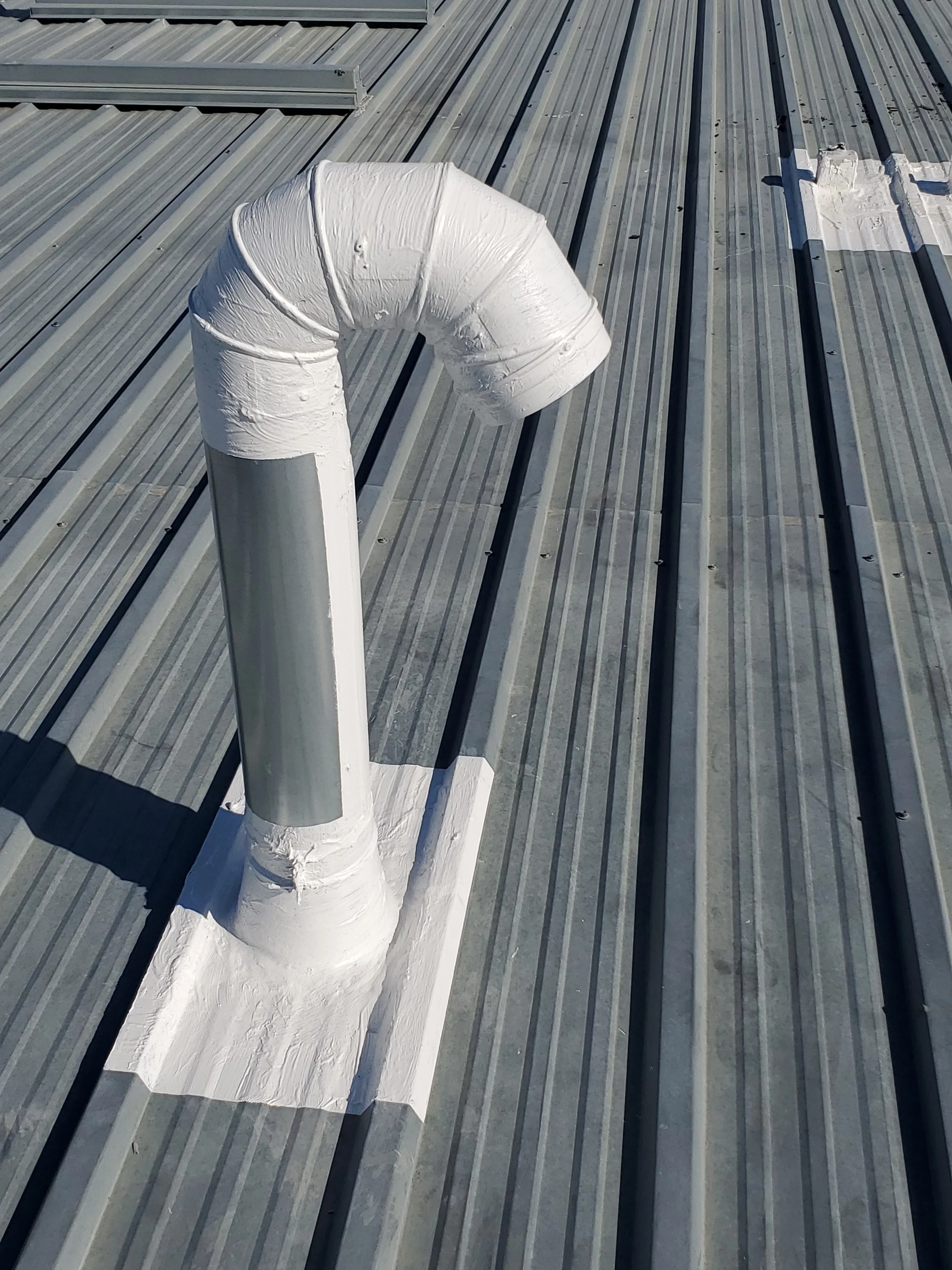 Roof Repair - Elastomeric Coating with re-enforcement 