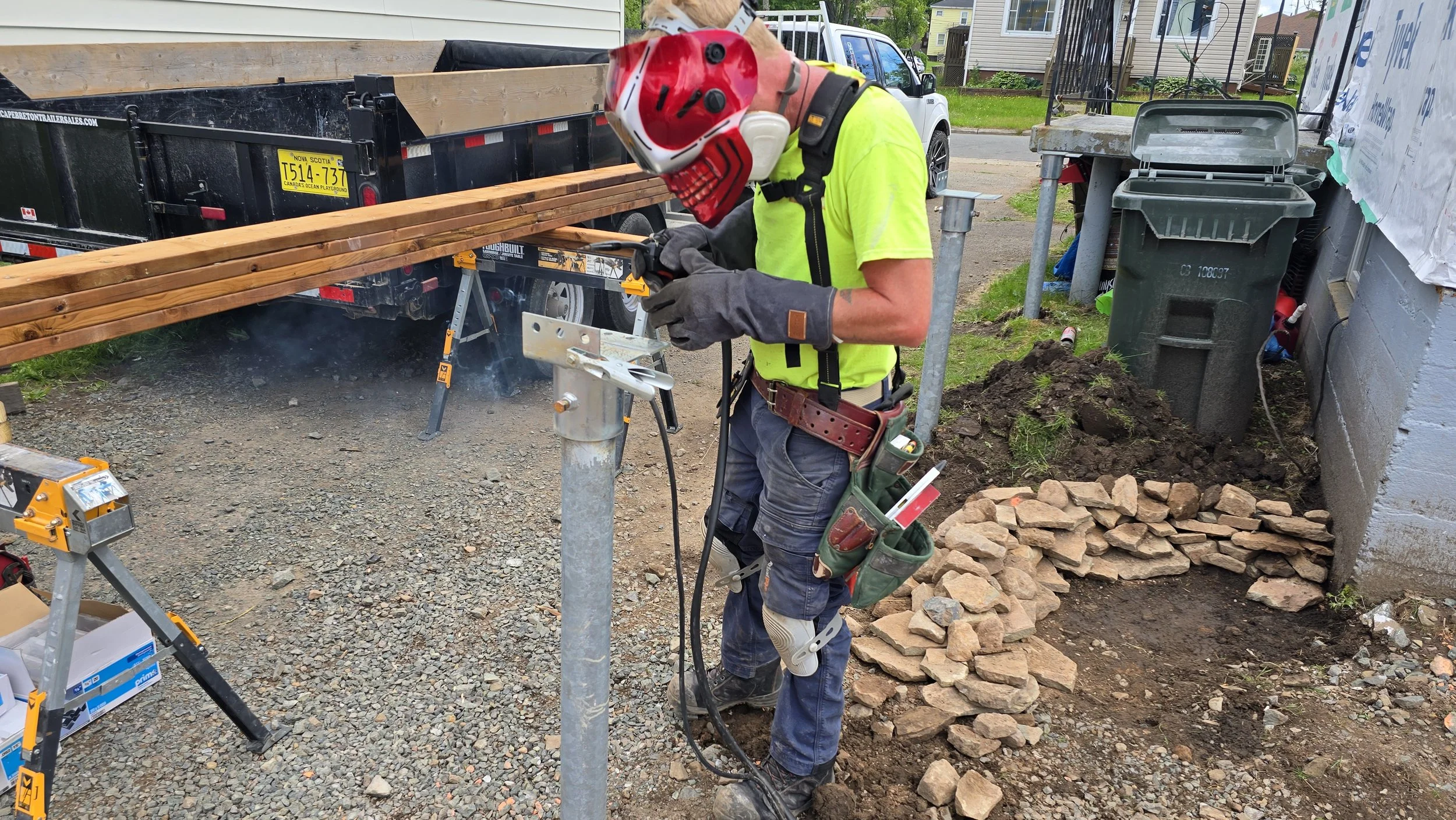 Everything starts with a good foundation.  These helical piles are a great option and will have no problem carrying the load of this new enclosed deck.
The set bolt will hold the saddle to the piling but let just weld it to be sure.