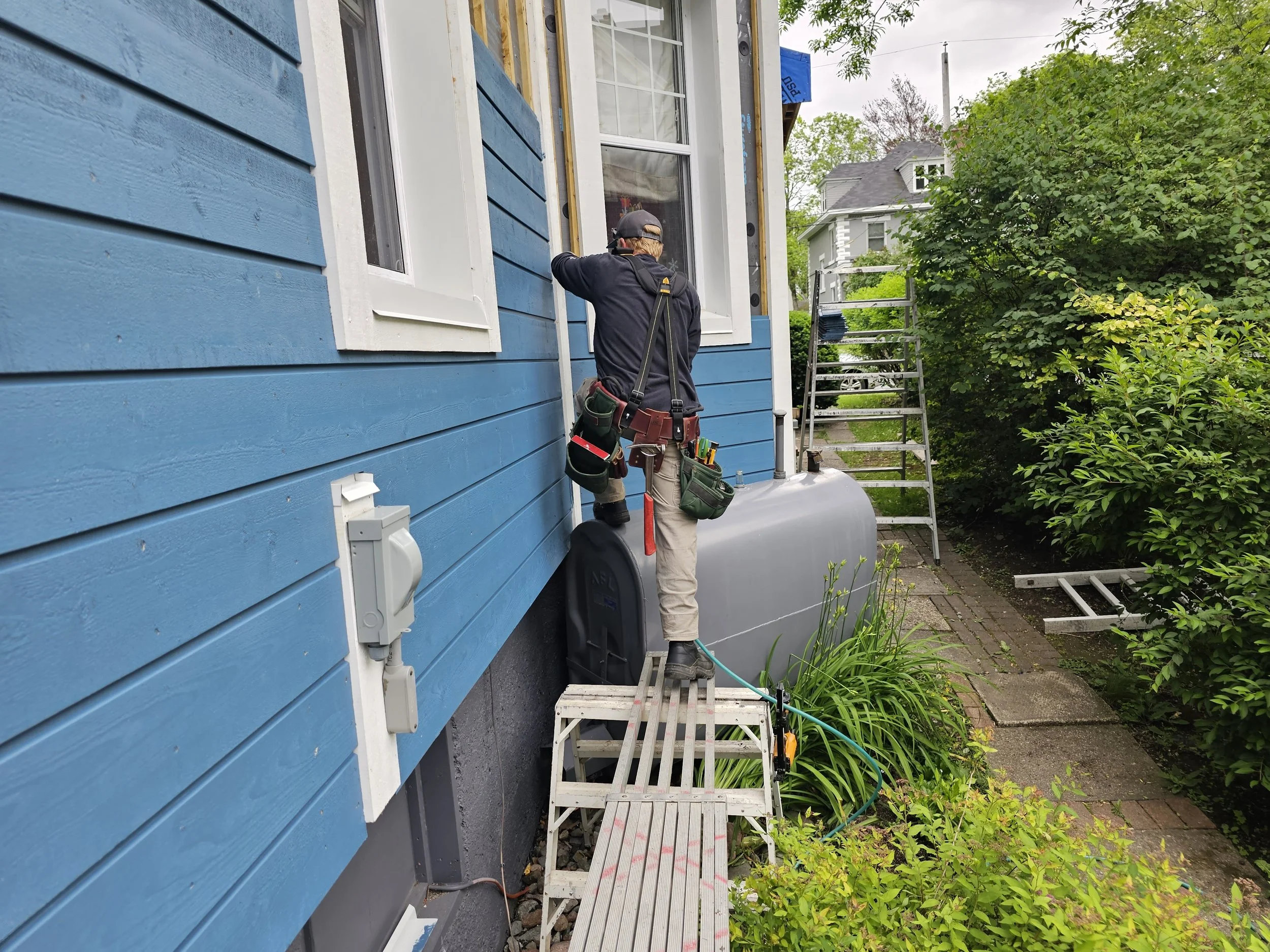 Layer by layer and row after row.  Ensuring the best results can be tedious and time consuming but in the end you are left with a install that it sure to last for years to come.