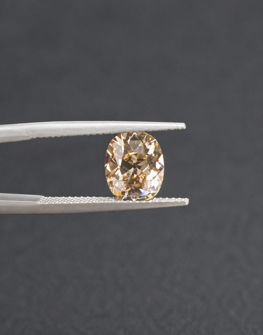 4.5 carat antique cushion cut diamond - light champagne