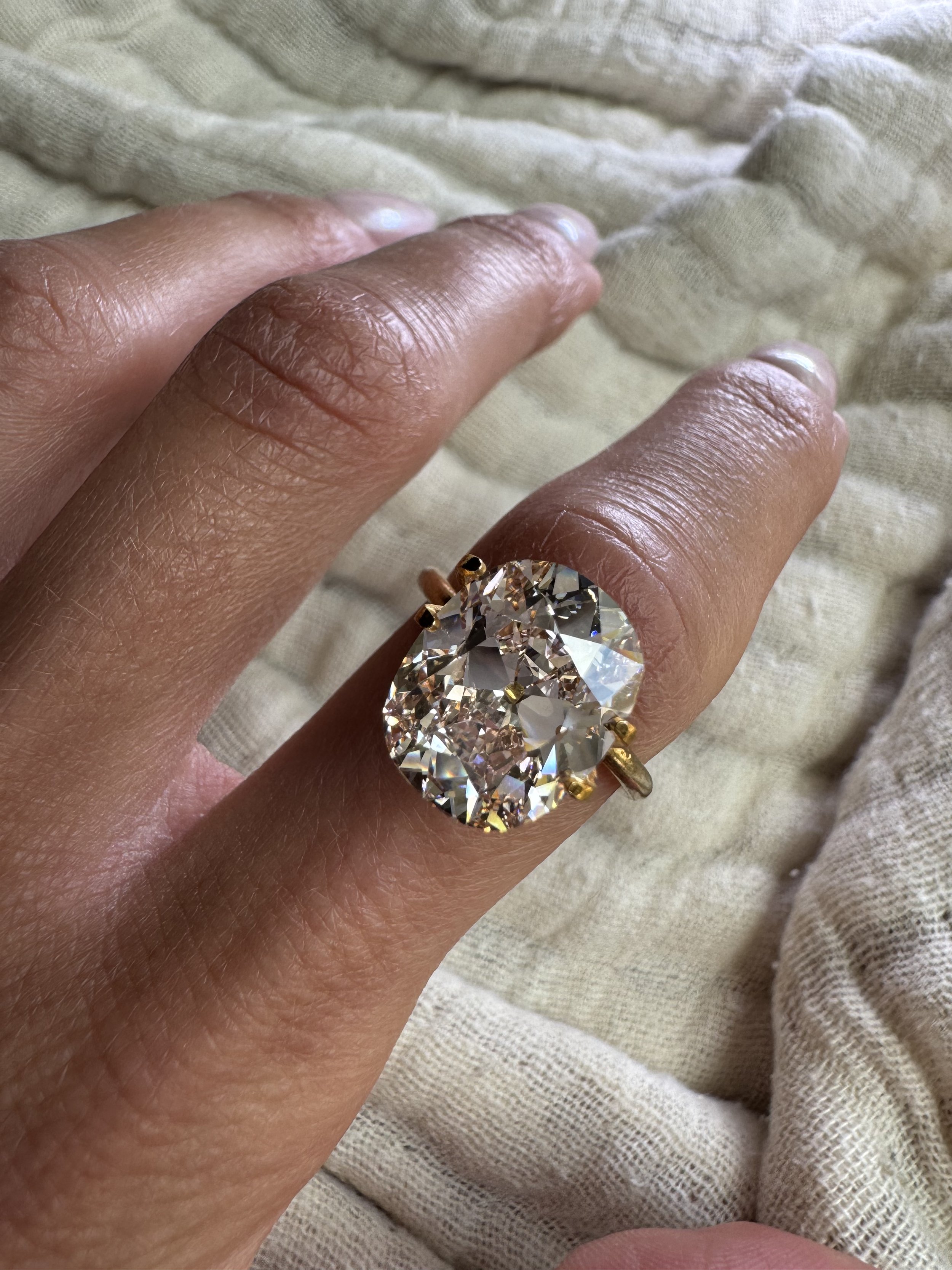 6.27 carat antique hybrid oval/cushion diamond - light champagne