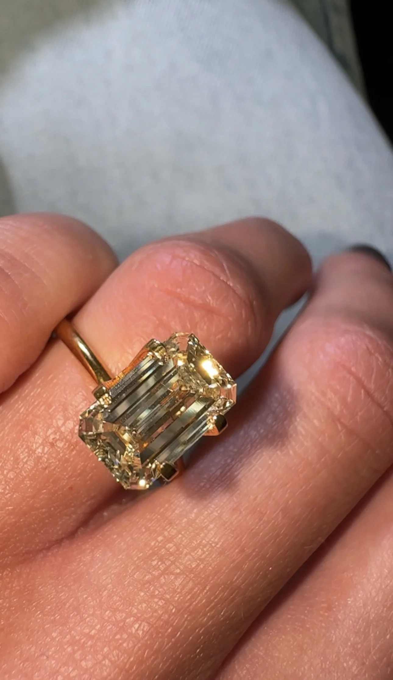 3.07 carat emerald cut diamond - light yellow champagne