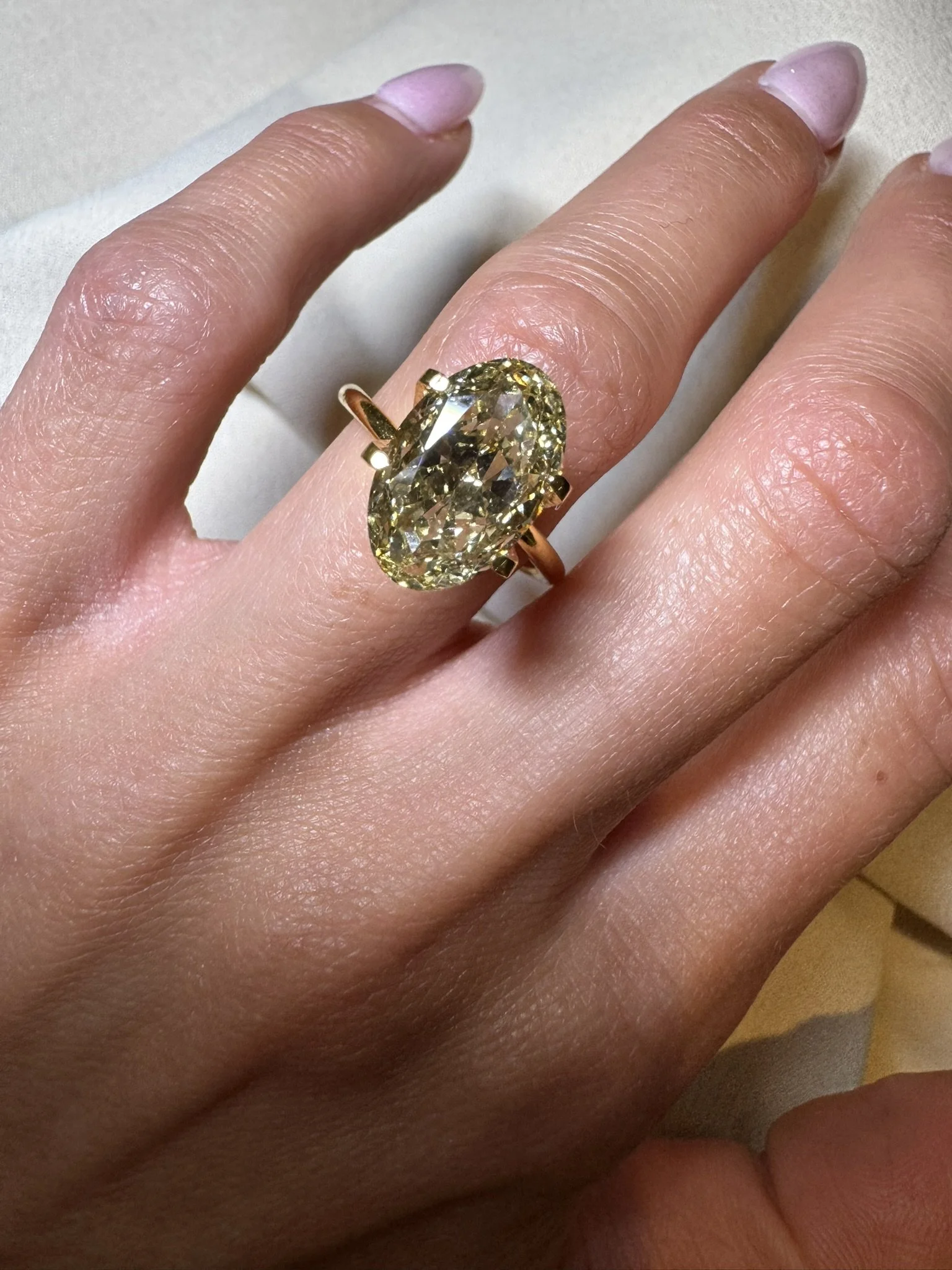 5.00 carat oval cut diamond - light yellow champage