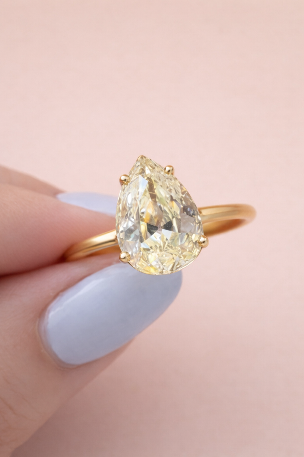 4.5 carat antique pear cut diamond - light yellow champagne