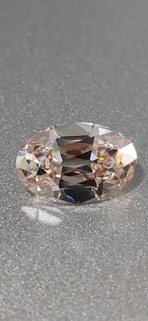 3.51 carat antique oval cut diamond - light pinkish champagne