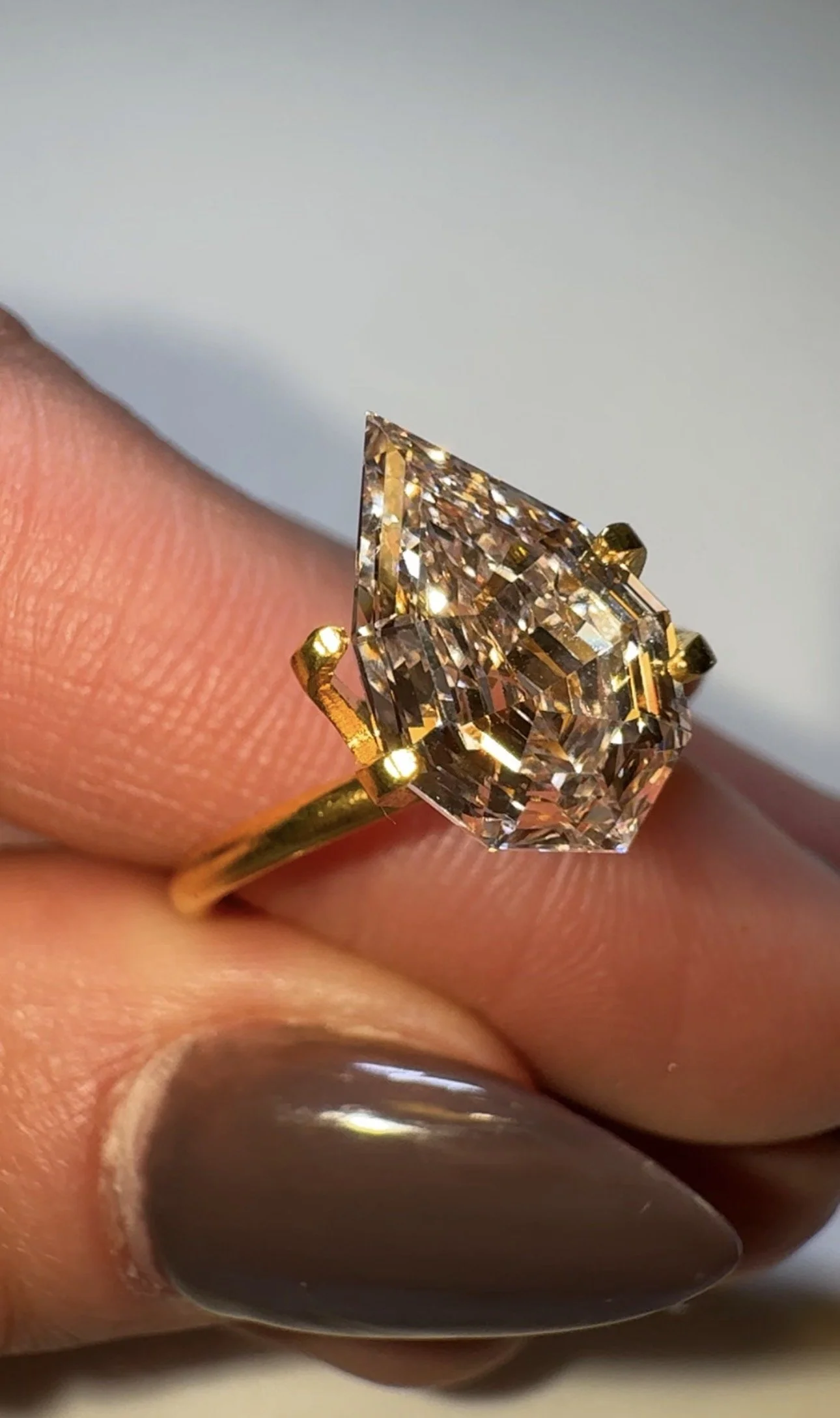 2.79 carat pear step cut diamond - champagne