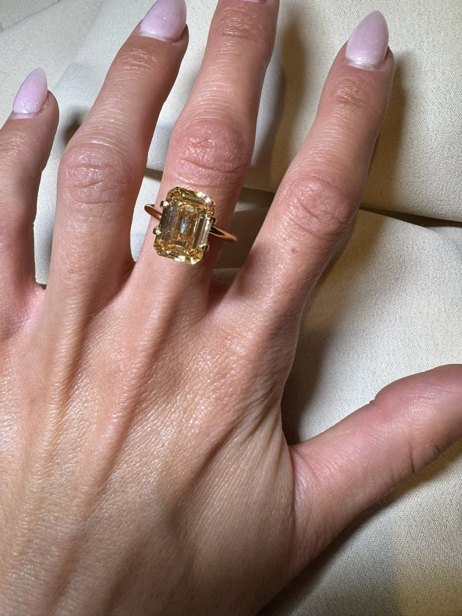 5.52 carat emerald cut diamond - yellow champagne