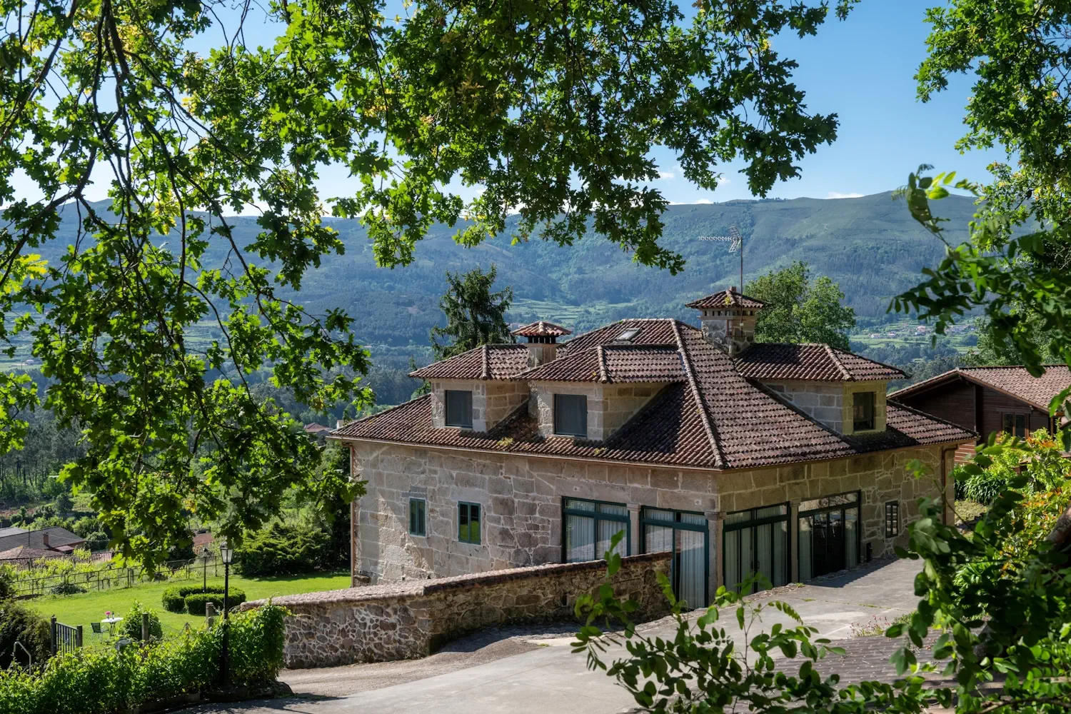 Stone building of a rural hotel in Arbo, Spain