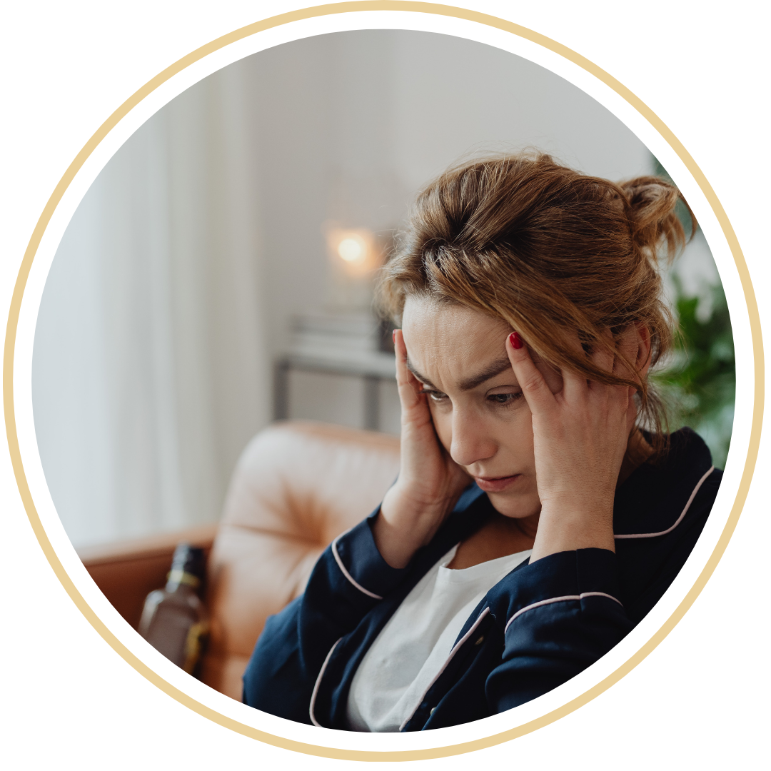 Exhausted mother holding her head in stress over baby sleep training not working