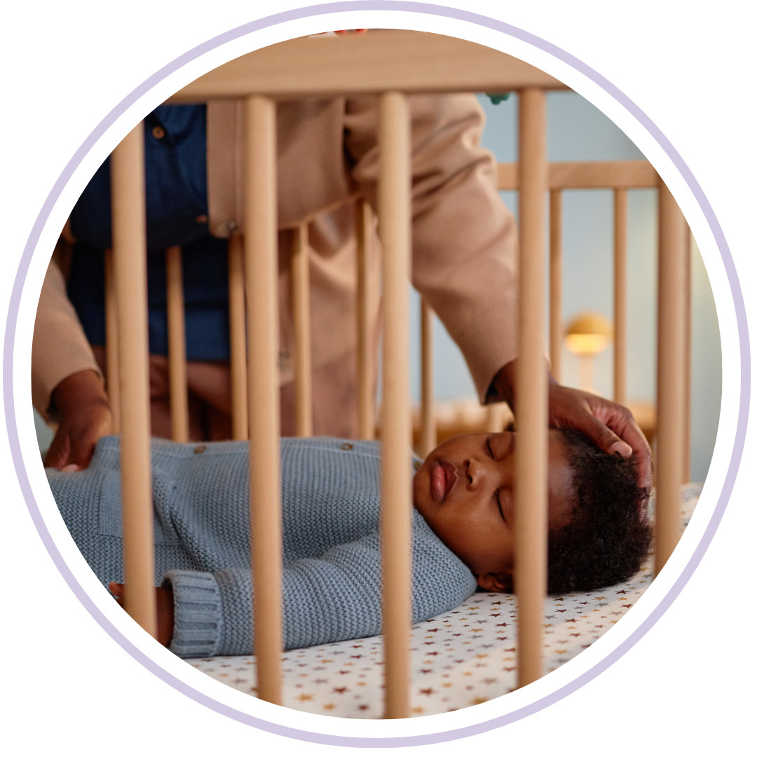 Responsive pediatric sleep coaching where a gentle parent provides comfort and reassurance to a calm baby in a crib during bedtime.