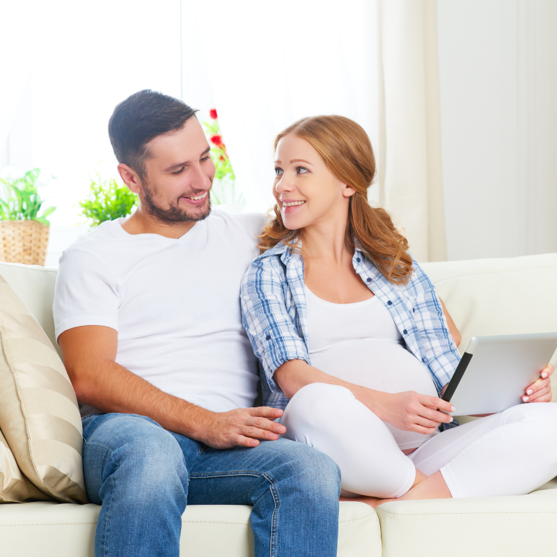 New parents learning newborn sleep foundations in virtual sleep coaching session"