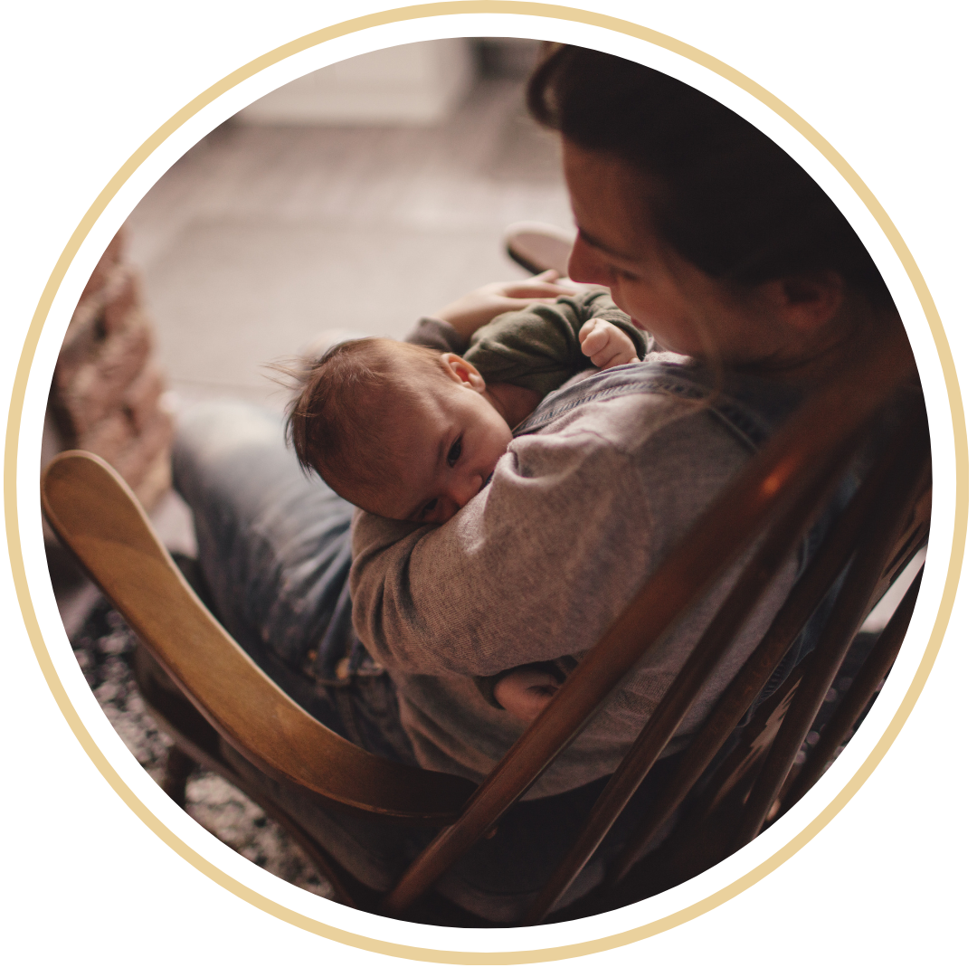 Mom nursing her baby to sleep, a common sleep association for infants