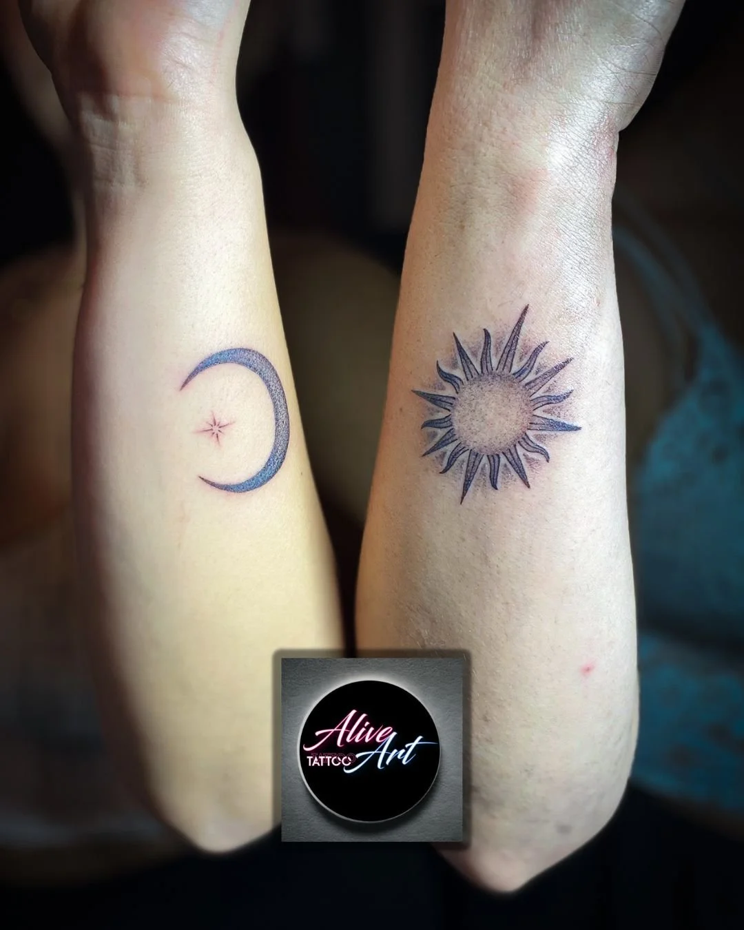 Tattoo of a crescent moon with a star and a small sun on a person's forearm, and a tattoo of a sun with radiating beams on the person's other forearm.