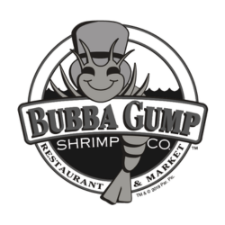 Logo of Bubba Gump Shrimp Co. restaurant and market featuring a smiling cartoon shrimp wearing a cap, with the company name in bold letters.