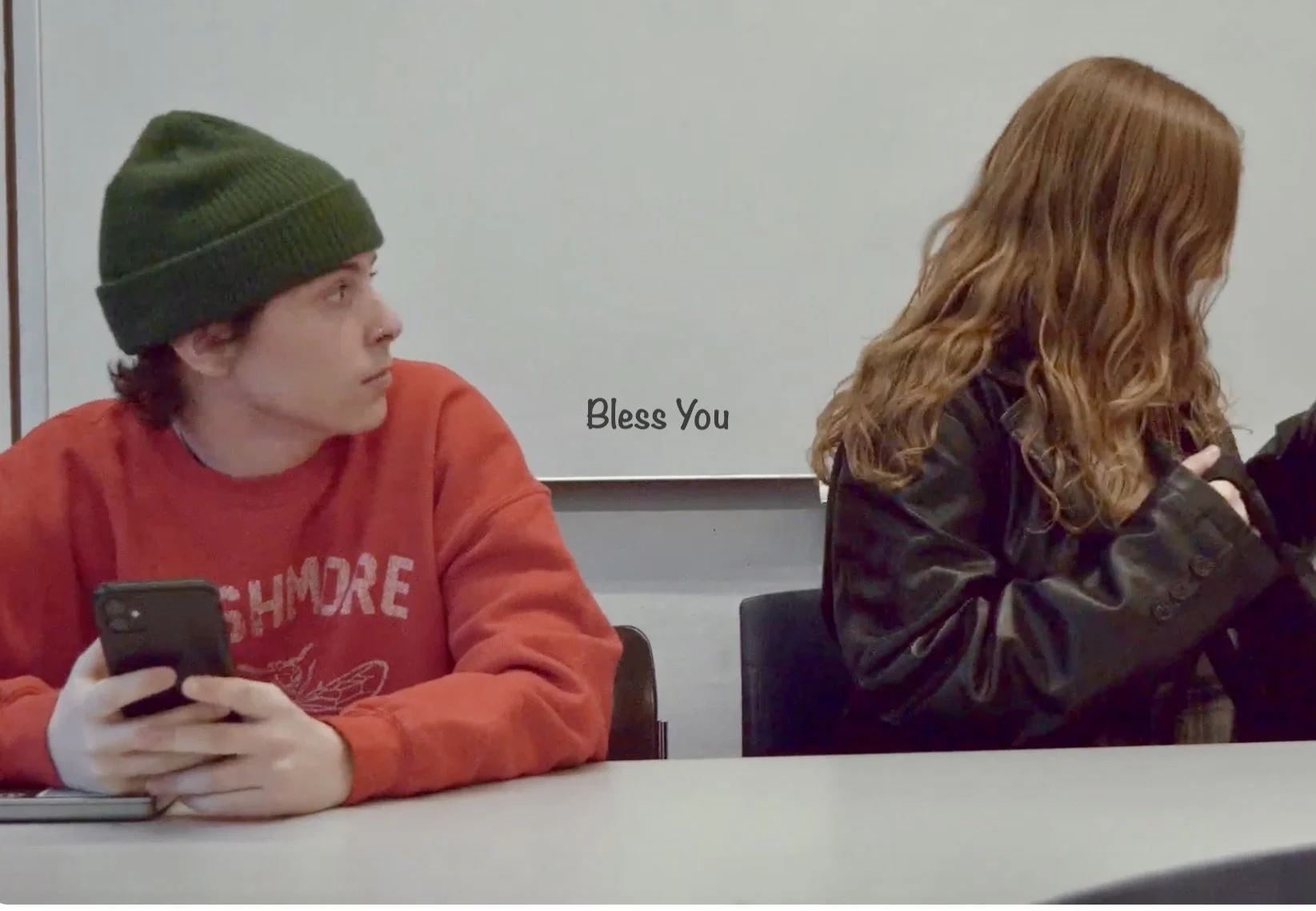 BLESS YOU, Director. Self-conscious student stays silent in class, sitting next to a girl he likes. Her first words to him are “bless you” after he’s sneezed, so he forces himself to sneeze. Eventually hurting his nose, never gains the courage to spe
