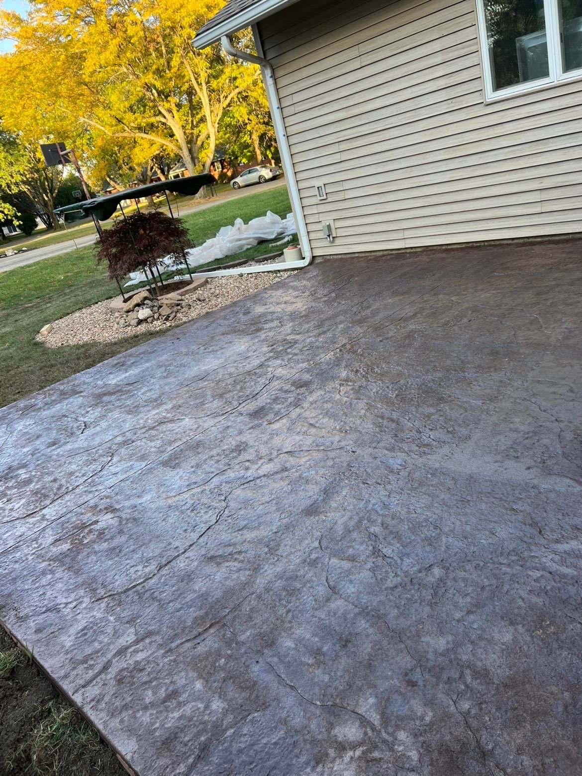 Freshly painted or stained concrete patio 