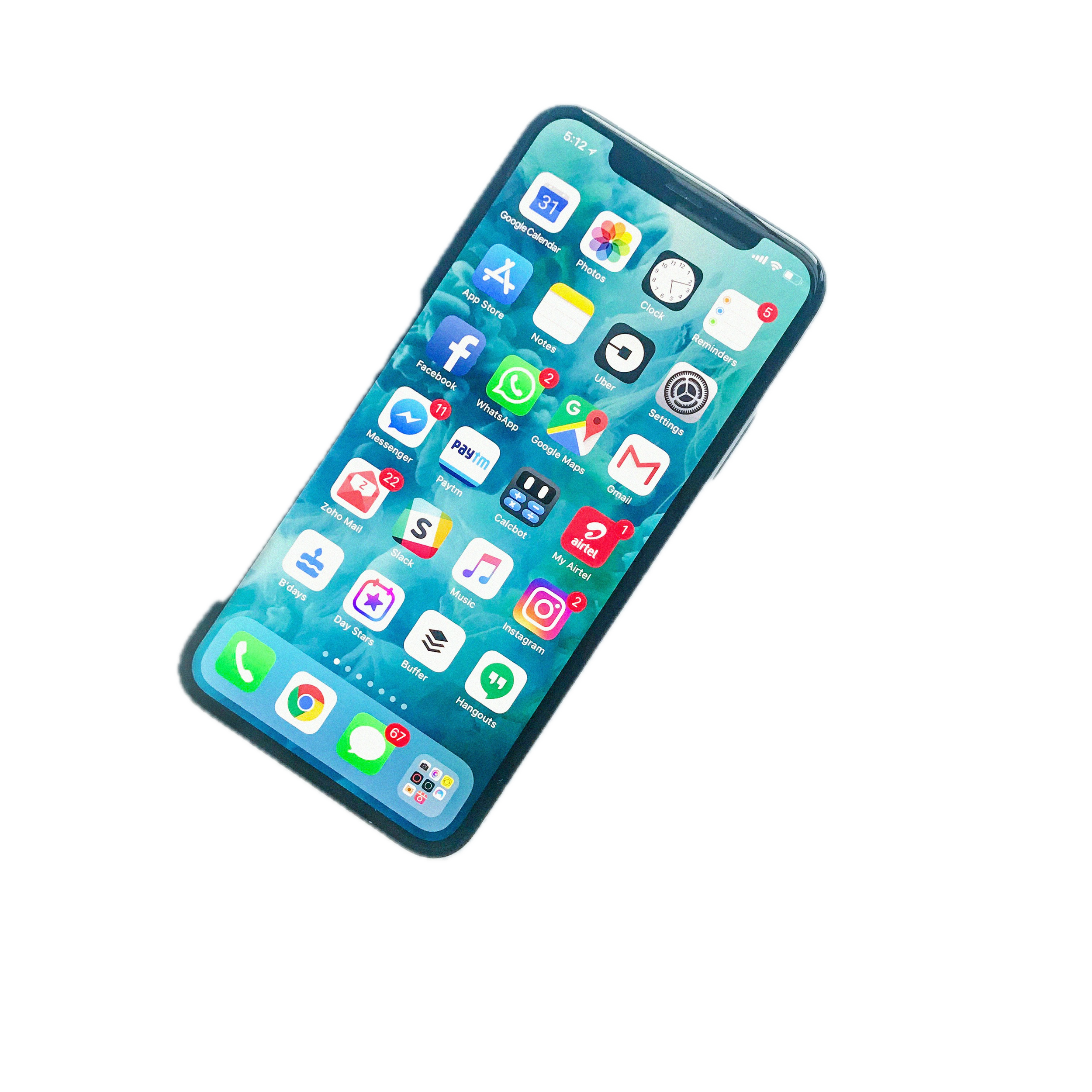 Close-up of a smartphone displaying various app icons on a colorful background, tilted to the right.