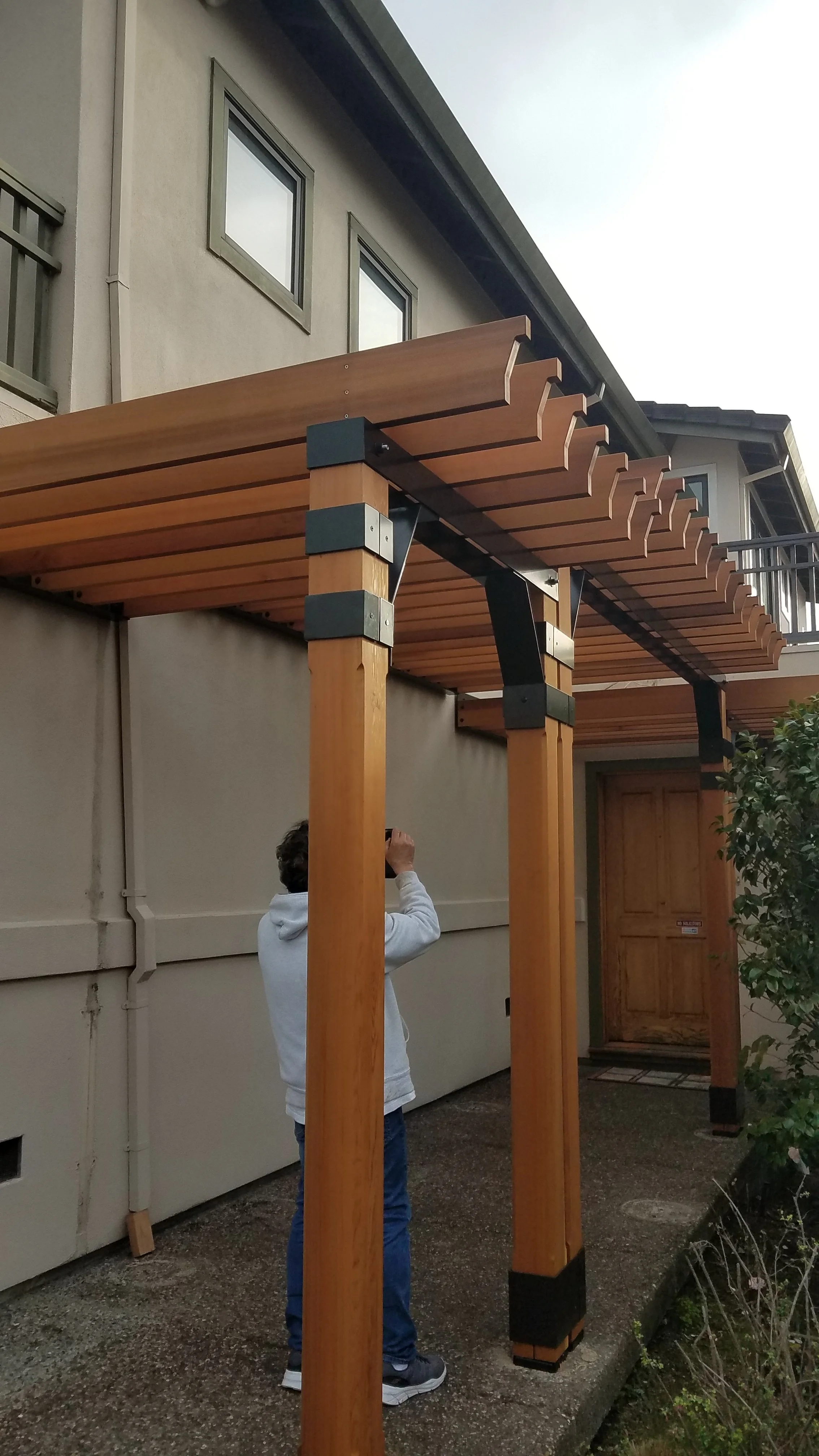 Custom Cedar Pergola in the Oakland Hills. I believe it was Northern White Cedar. Custom Steel Brackets for the wall side and Custom steel straps and headers on the floating side.