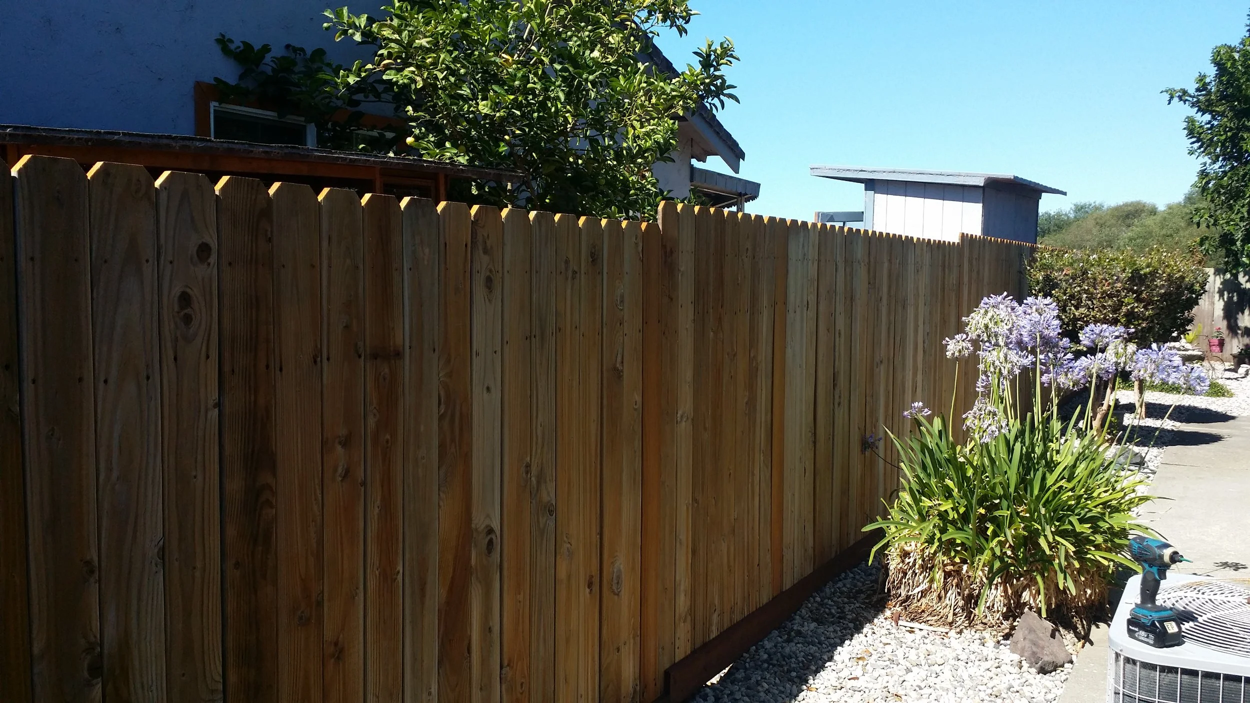 Fence rebuild with new posts and rails, cleaned up the old fence boards and reused them. American Canyon