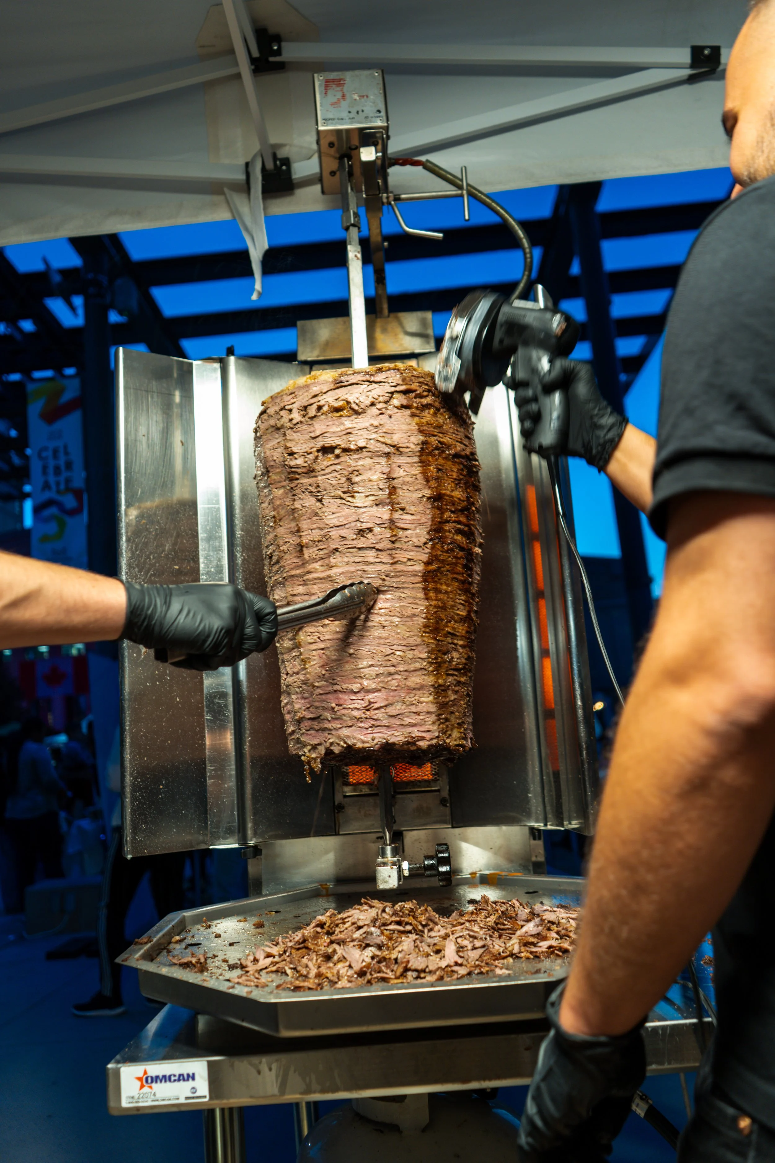 Turkish Restaurant at a food festival cutting doner.