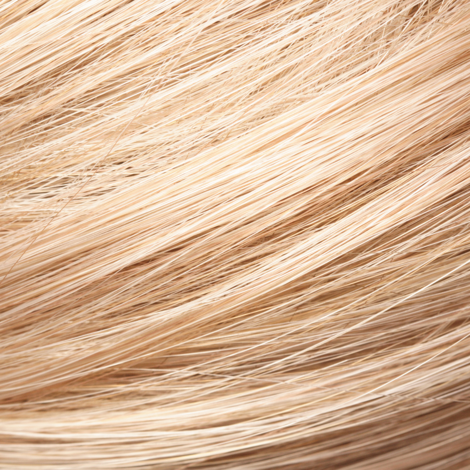 Close-up of light brown, wispy, and textured animal fur or hair.