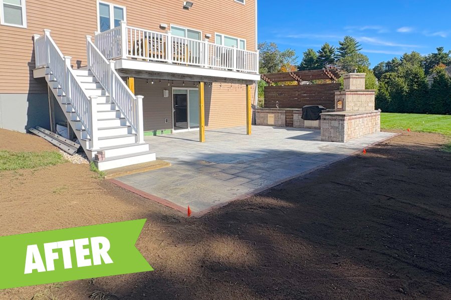 Reinforced deck, installed drainage, retaining wall, graded and extended patio space with new pavers.