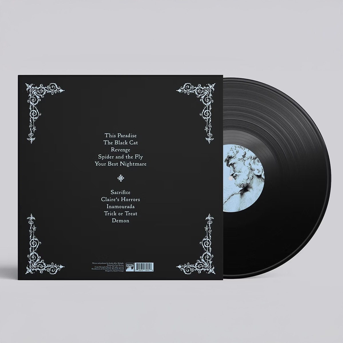 Black vinyl record partially pulled out from a black album cover with white ornate corner designs, featuring song titles and track listing in light blue text on the back cover.