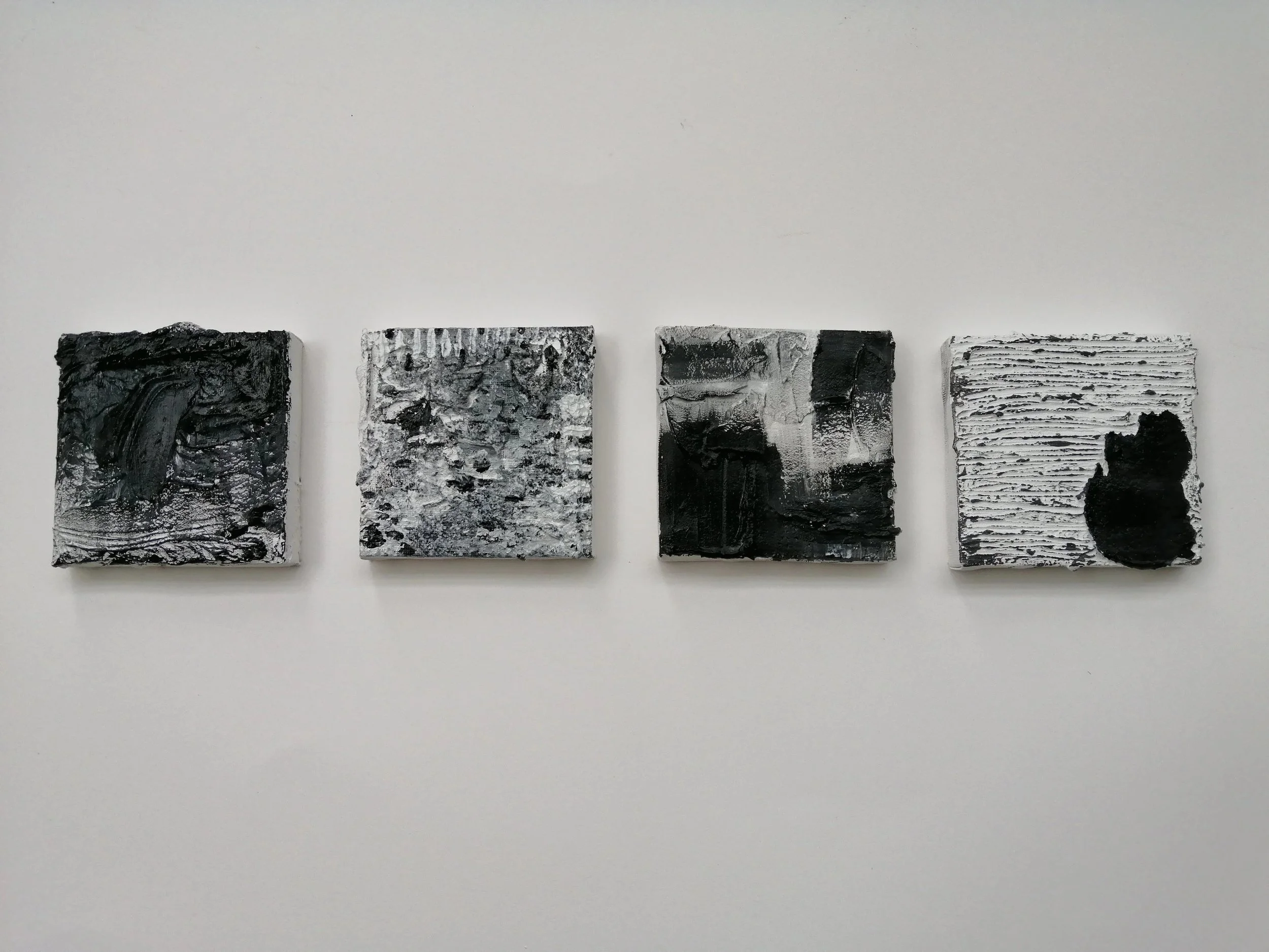 Series of 4 10x10cm stretched canvases -Polyfilla and acrylic paint - 2019. Exploration with various surfaces and brush strokes to emphasise texture for later examination inform more selective work. 