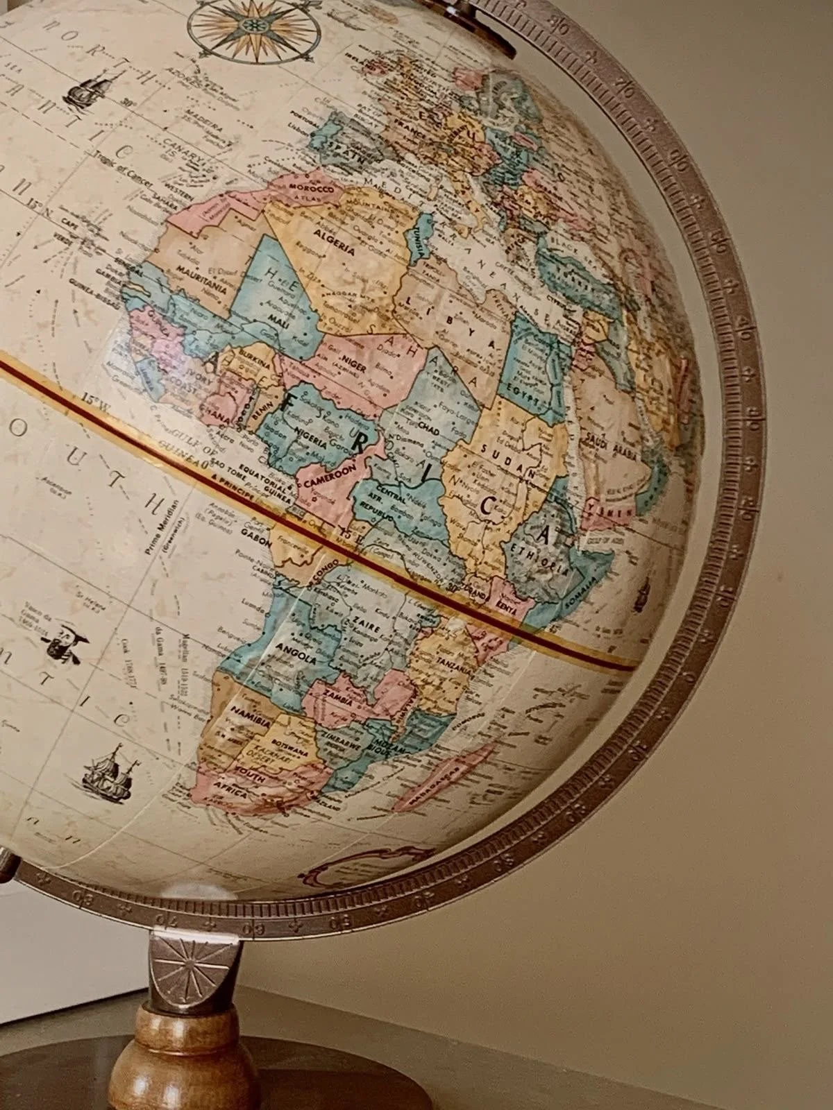 A vintage world globe focused on Africa, Europe, and parts of the Middle East.