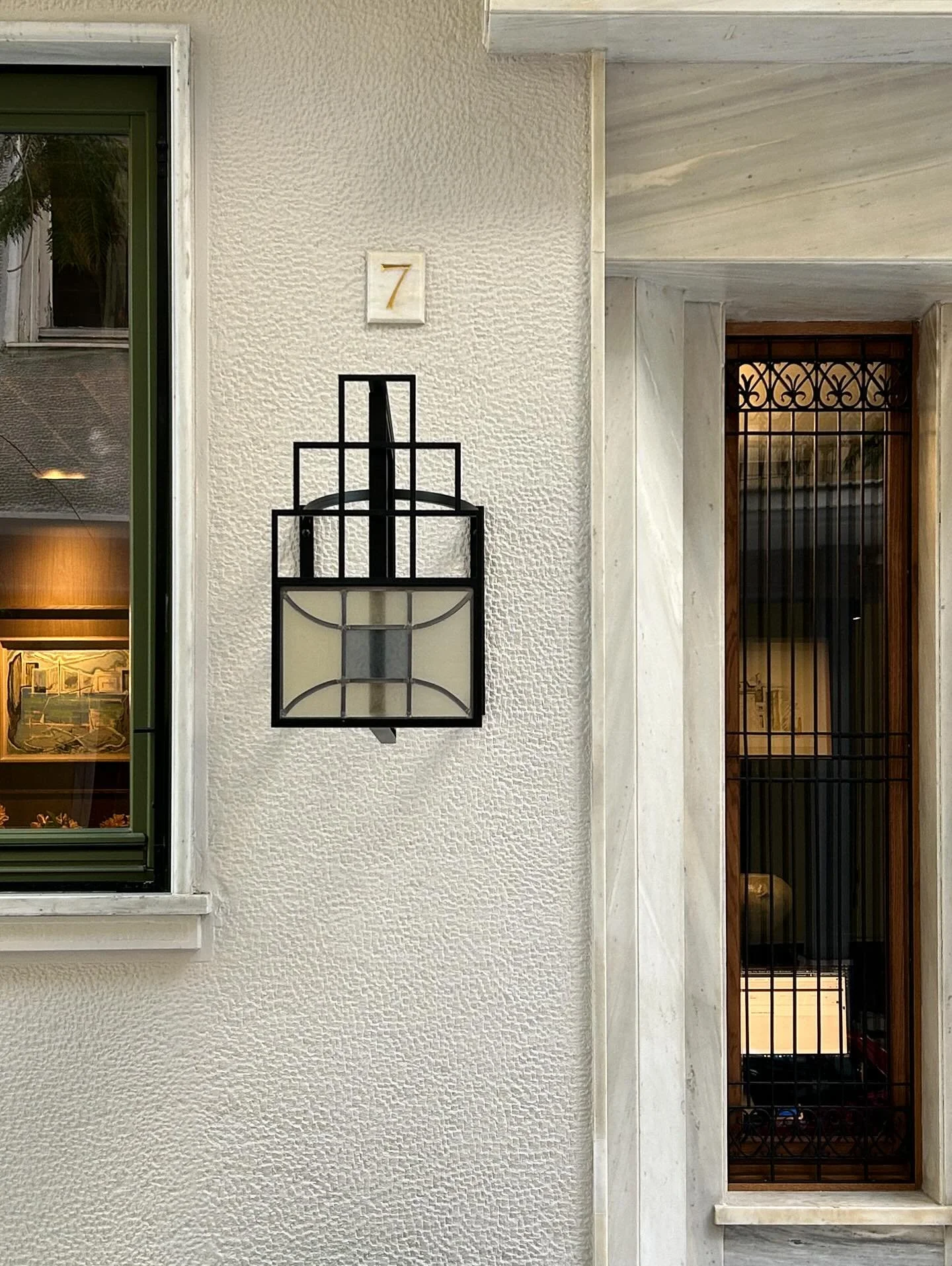 Between International Movement &amp; Athenian Bourgeoisie 
Between G.Steris &amp; N. Hatzikyriakos-Ghikas

Our detailed steel and stained glass signage inspired by C.R. Mackintosh, adapted to the buildings heritage patterns and designed especially fo
