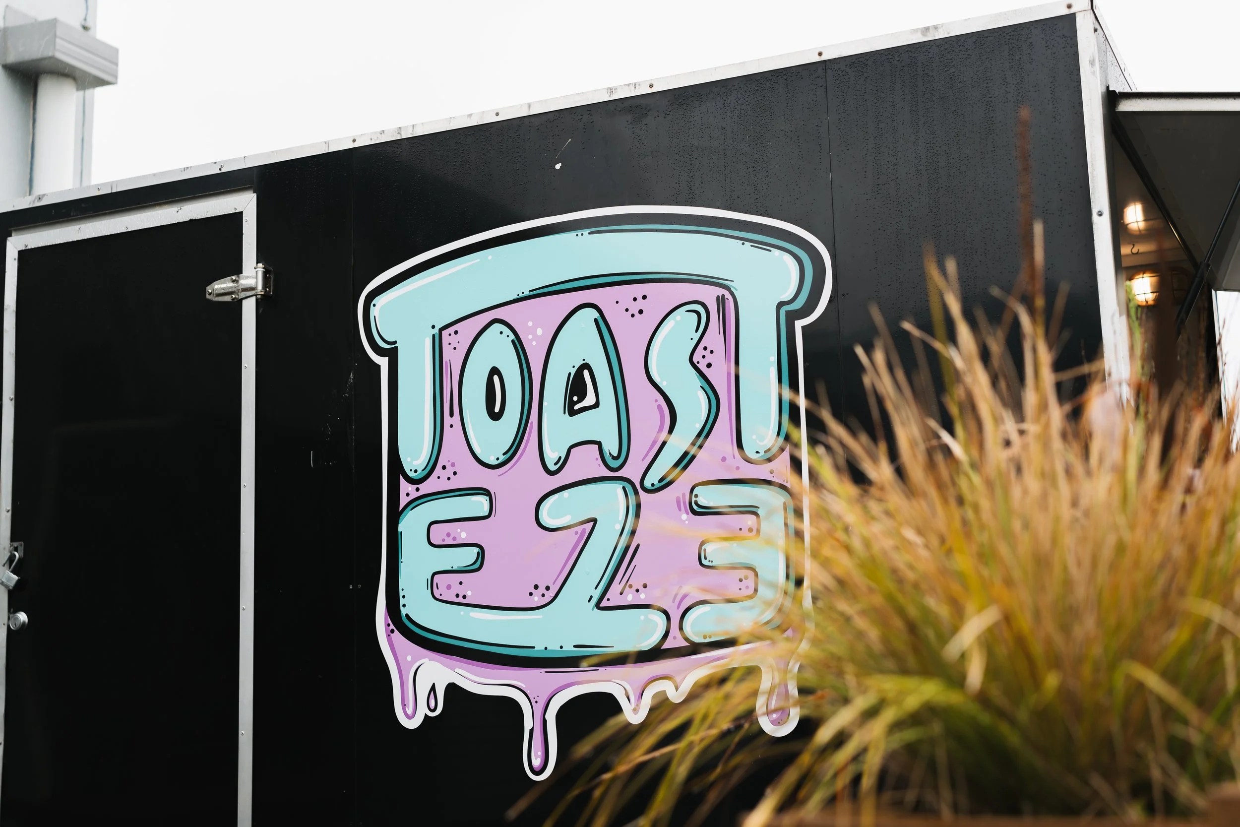 Signage for Toasteze, located in Naenae, Lower Hutt