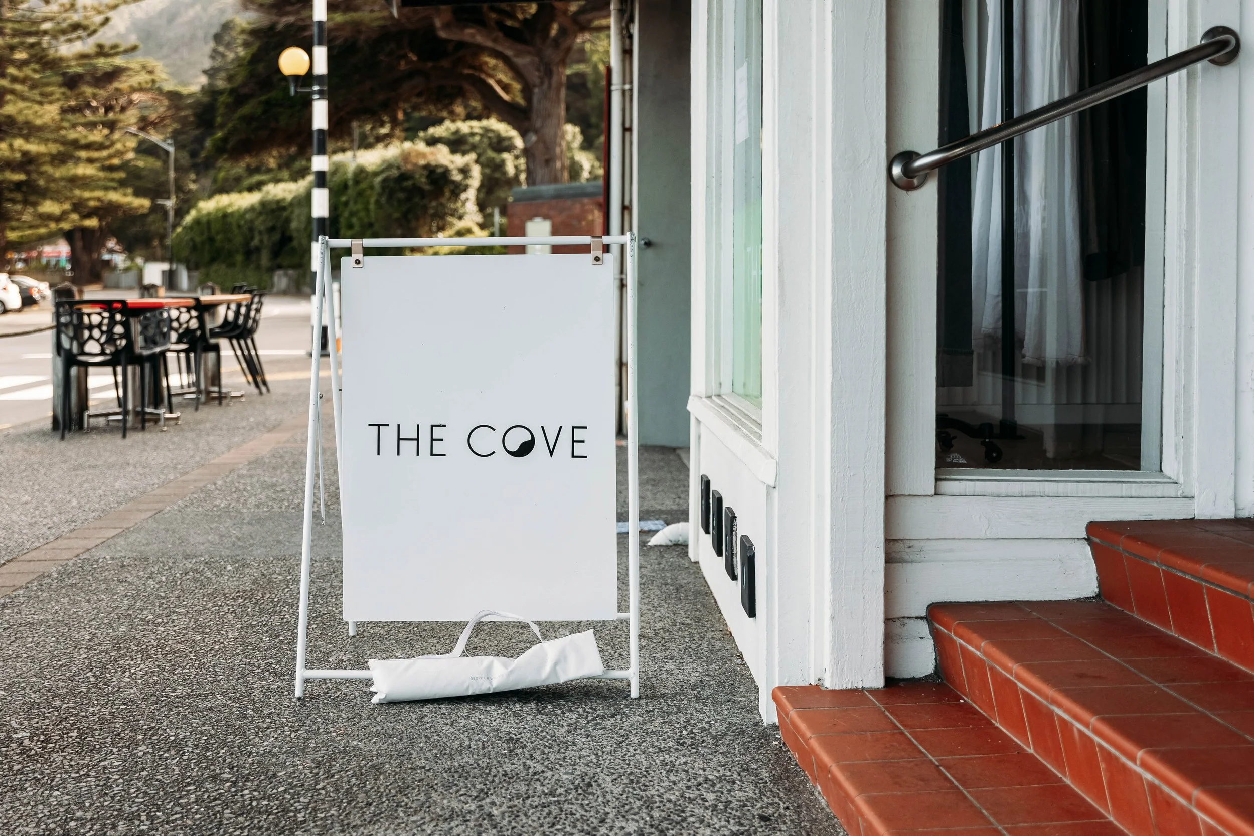 Exterior image of The Cove's signage, located in Eastbourne Wellington