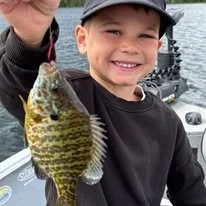 Heindls Fishtails guide service teaching children how to fish Rhinelander Wisconsin