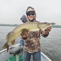 Catching trophy Pike in St. Germain Wisconsin while on a guided fishing adventure
