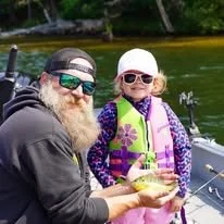 Boat tours are a good idea to spend a summer vacation day while catching fish in Minocqua Wisconsin.