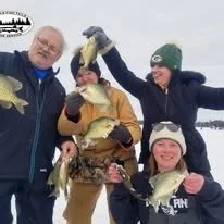 A successful day ice fishing with Minocqua Wisconsin guided fishing trip 2025