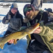 A guided ice fishing tour catching northern Pike is a exciting way to spend a day in Minocqua Wisconsin