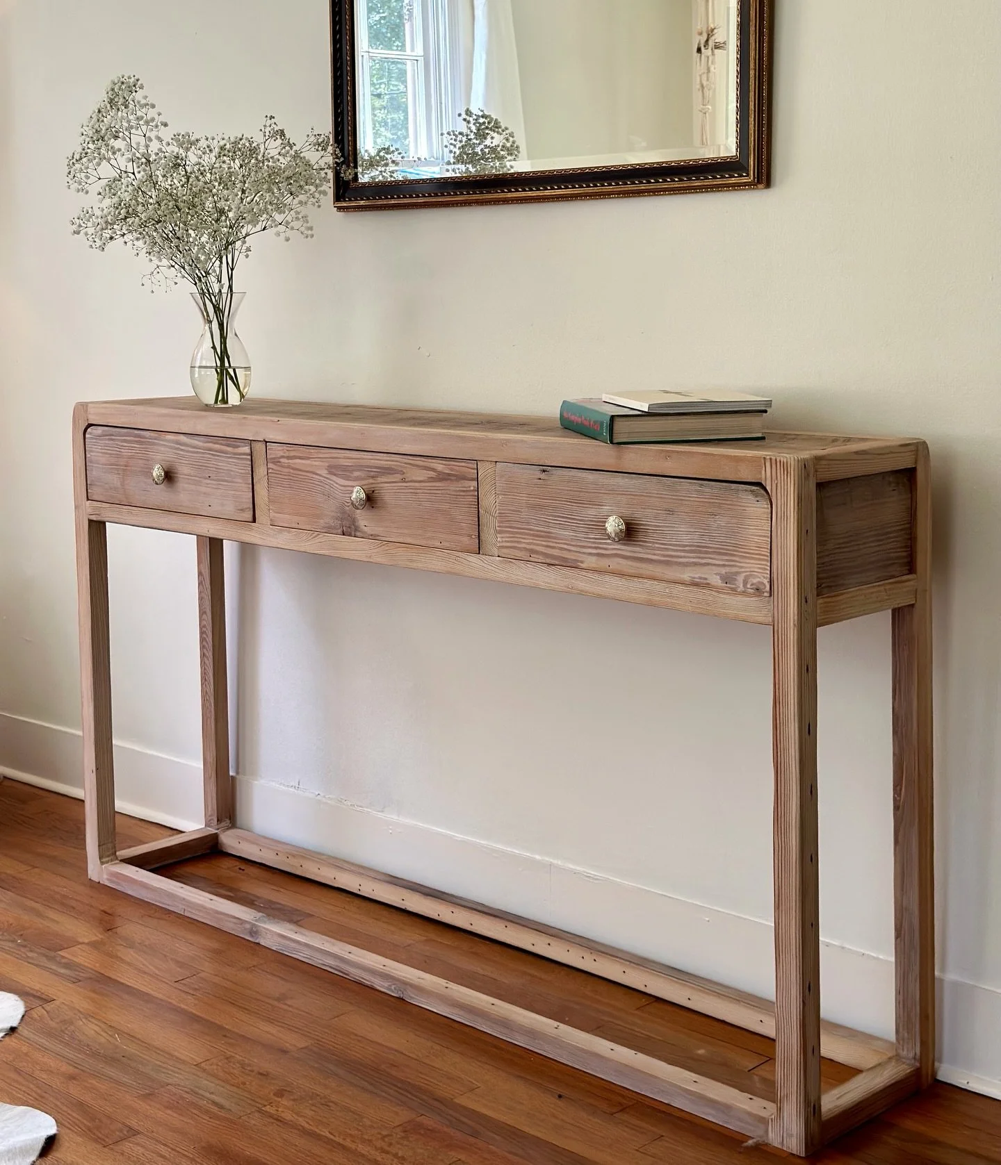Reclaimed Pine out of a fire damaged property in New Orleans, LA. Home was believed to be built in the late 1800s. Now a functional console table ♻️ 
#woodwork #interiordesign #furniture #craftsmanship