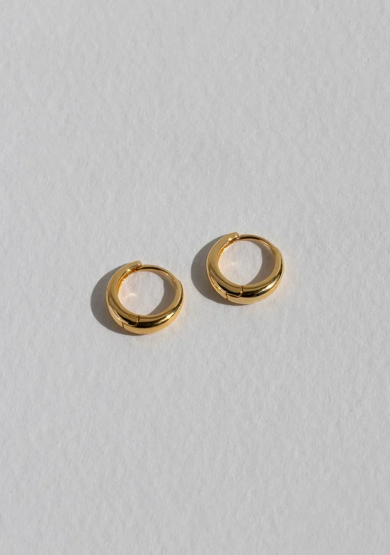 Positano_Mini_Hoops_-_Gold_1_194d7b24-52fb-4bbb-a569-a48213c60f88.webp