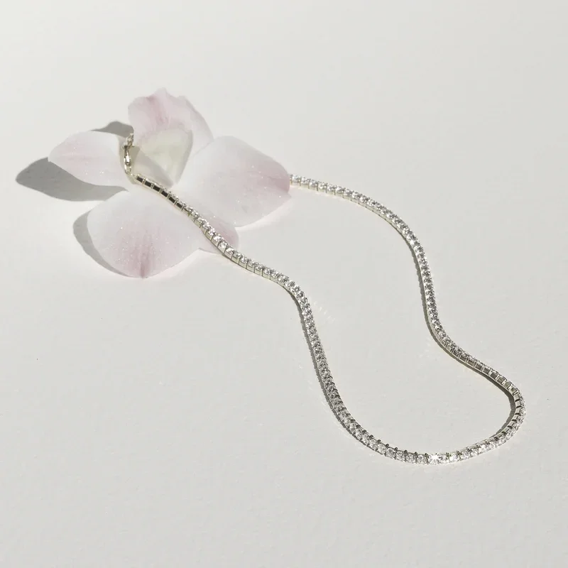ASPENNECKLACEFLATLAYSILVER.webp