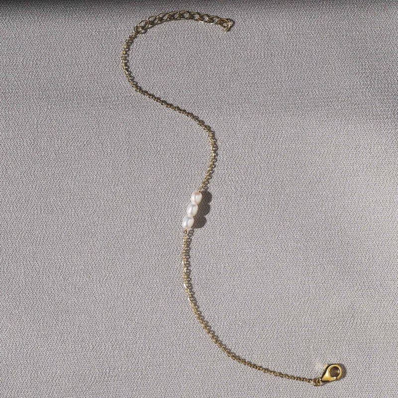 MiniPearlBraceletGoldSQ_86f6b7b3-8f39-4c13-bda5-00b92f928017.jpg