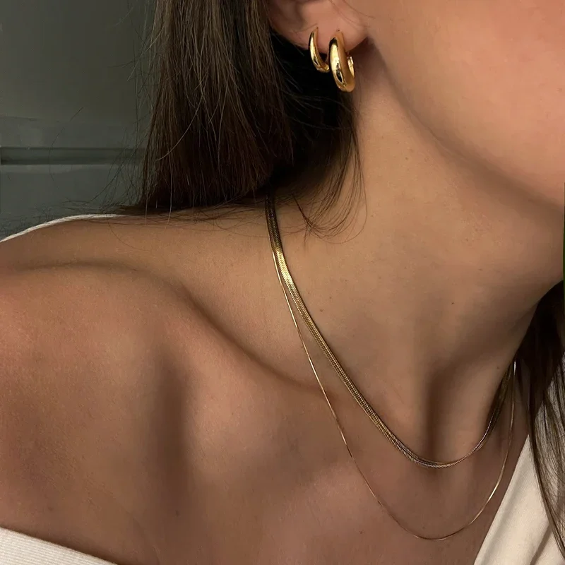GretaSamPositanoMiniPositanoHoopsBerlinSphinxNecklace_25f3c504-025a-4a10-ab46-b1282663ad21.webp