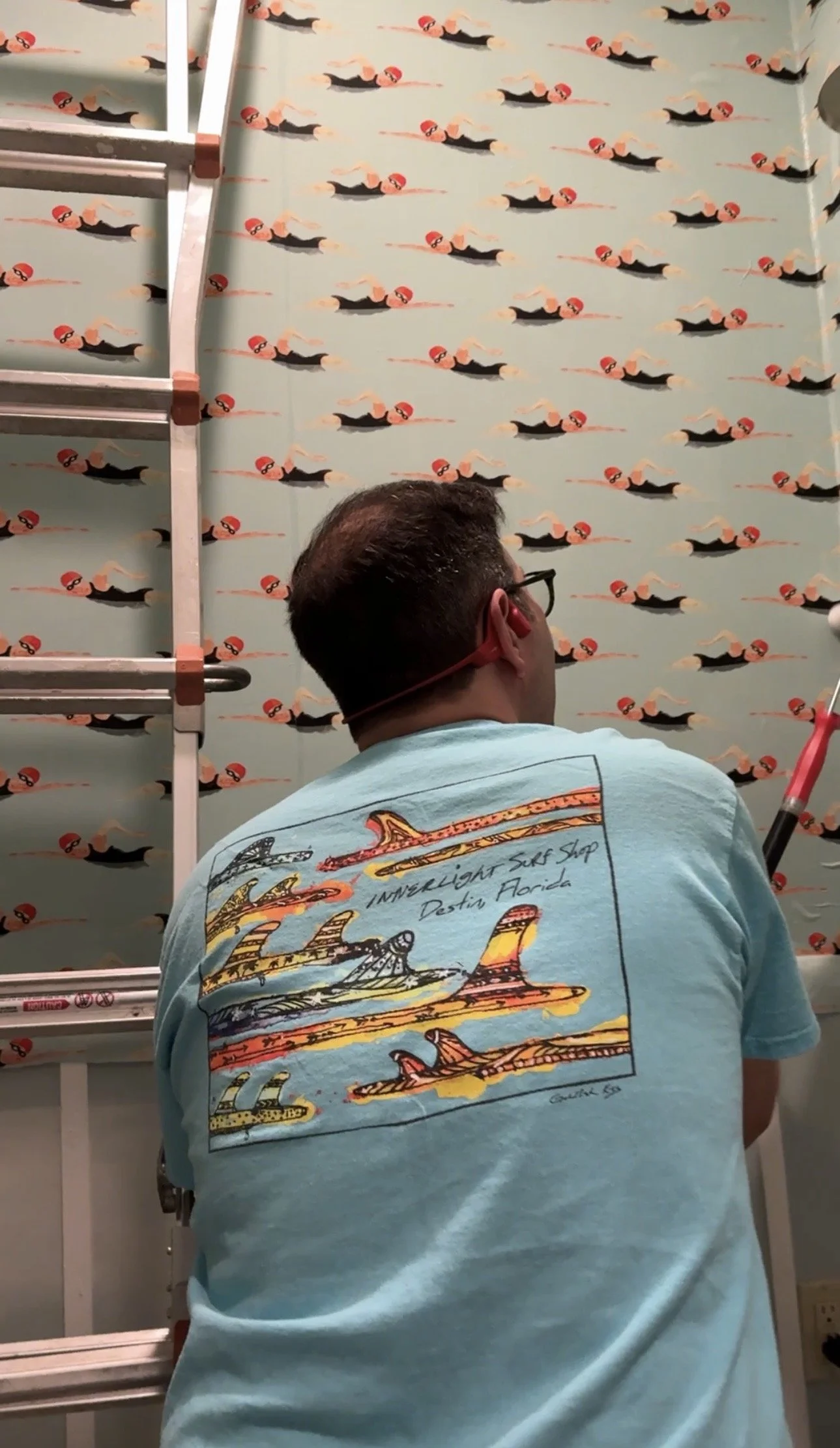 Bathroom molding and wallpaper install.