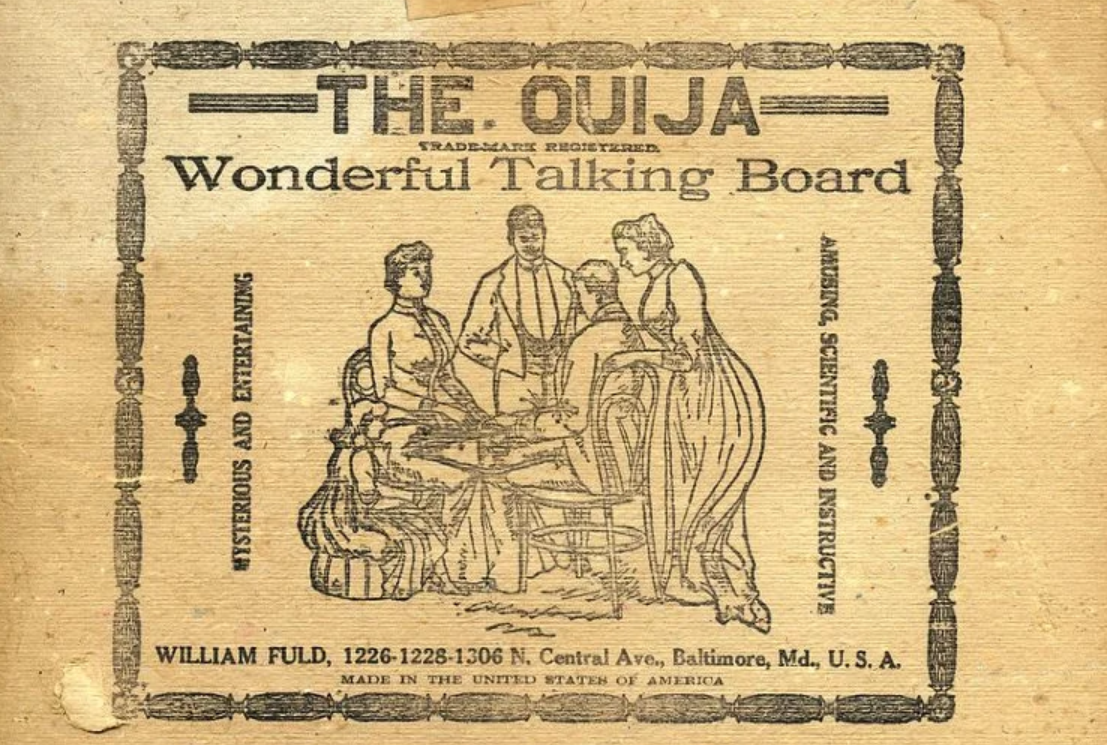 A wooden Ouija board with the phrase "Wonderful Talking Board" etched on its surface.