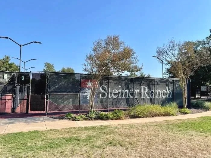 A Towne Square tennis court at Steiner Ranch