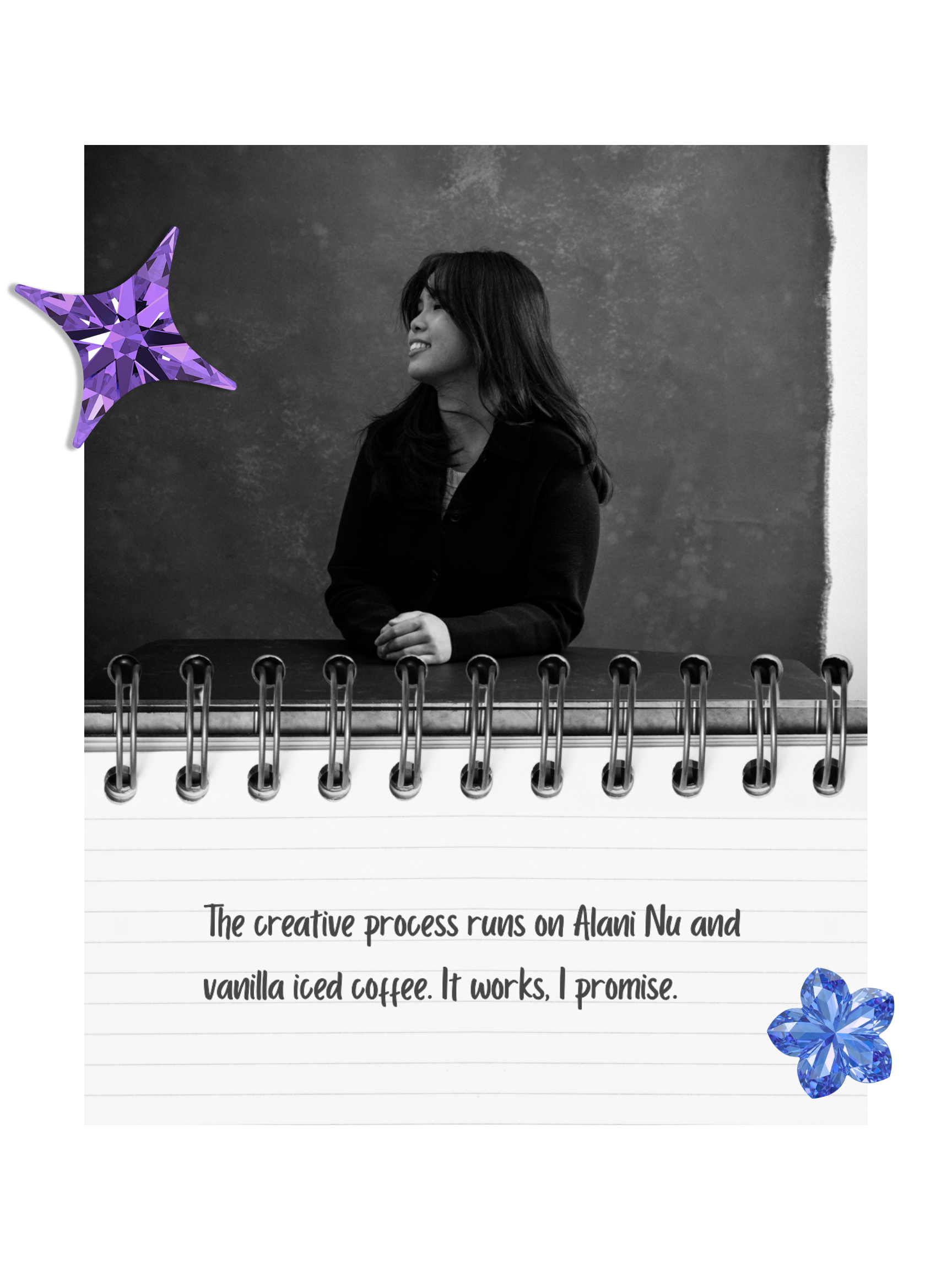 A black and white photo of a woman smiling, sitting at a table with a colorful star-shaped balloon and a decorative flower sticker nearby. There is a note with handwritten text that says, "The creative process runs on Alani Nu and vanilla iced coffee. It works, I promise."