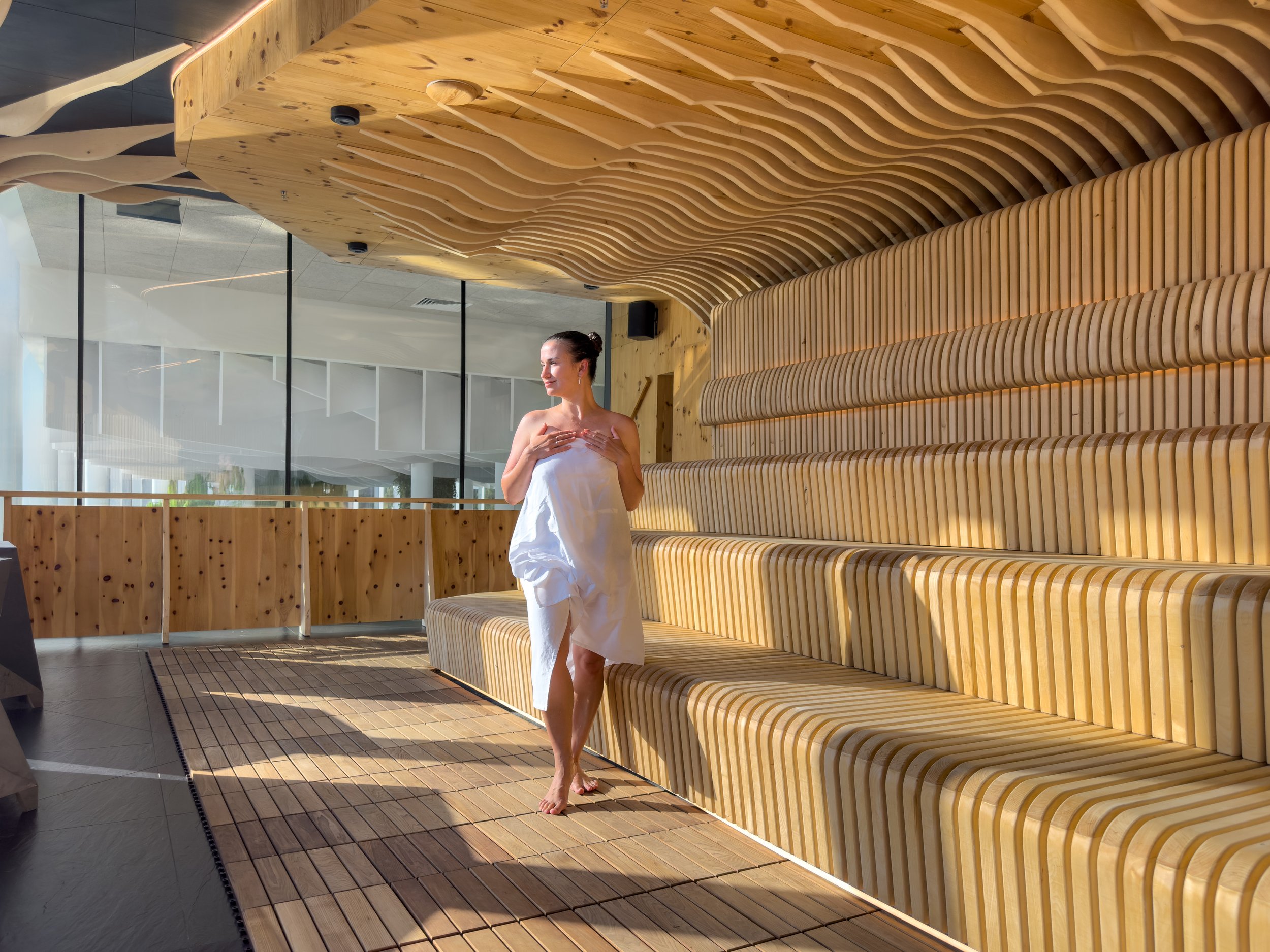 model-sauna-sunlit-walk-wooden-waves.jpg