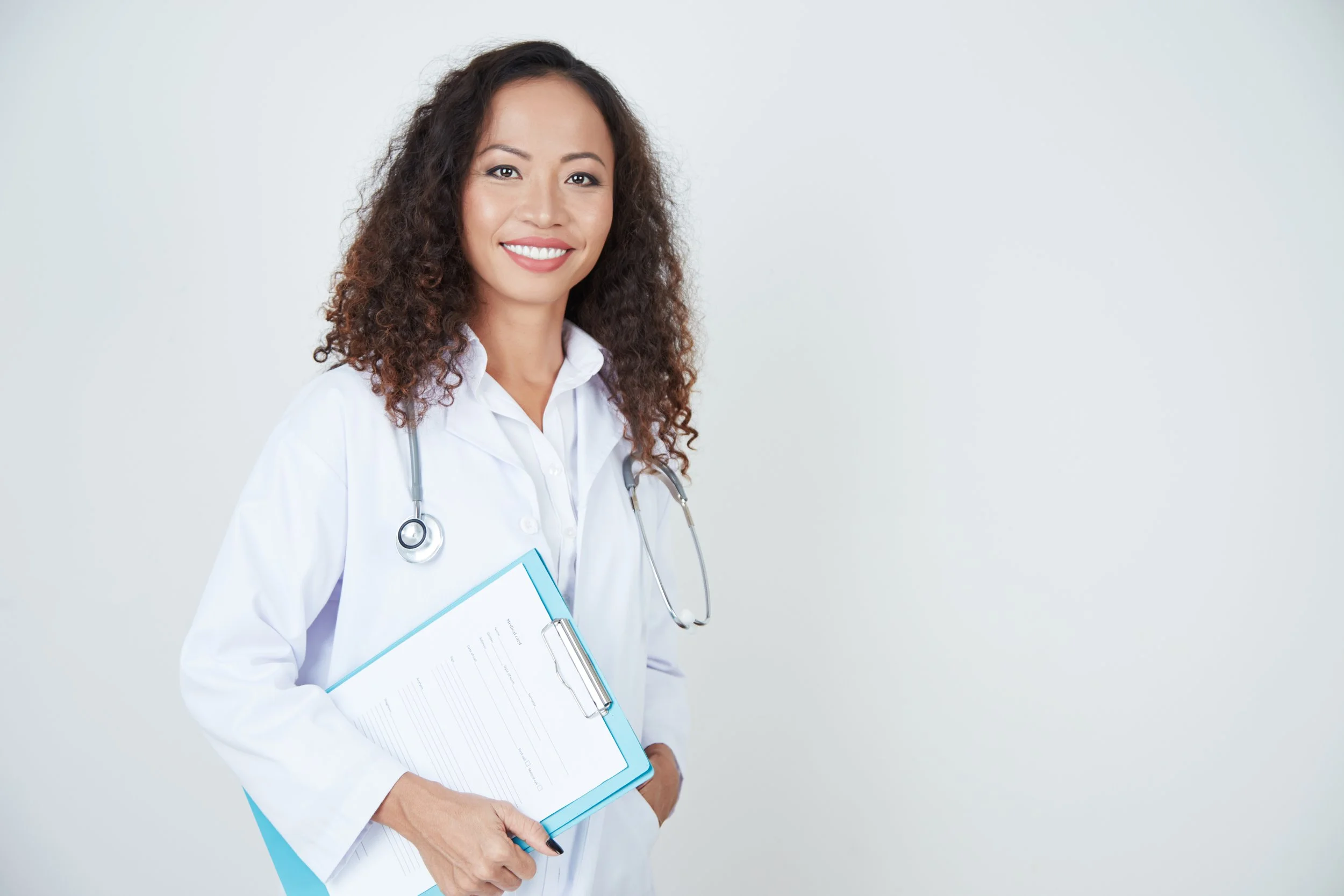 doctor-standing-with-health-card.jpg