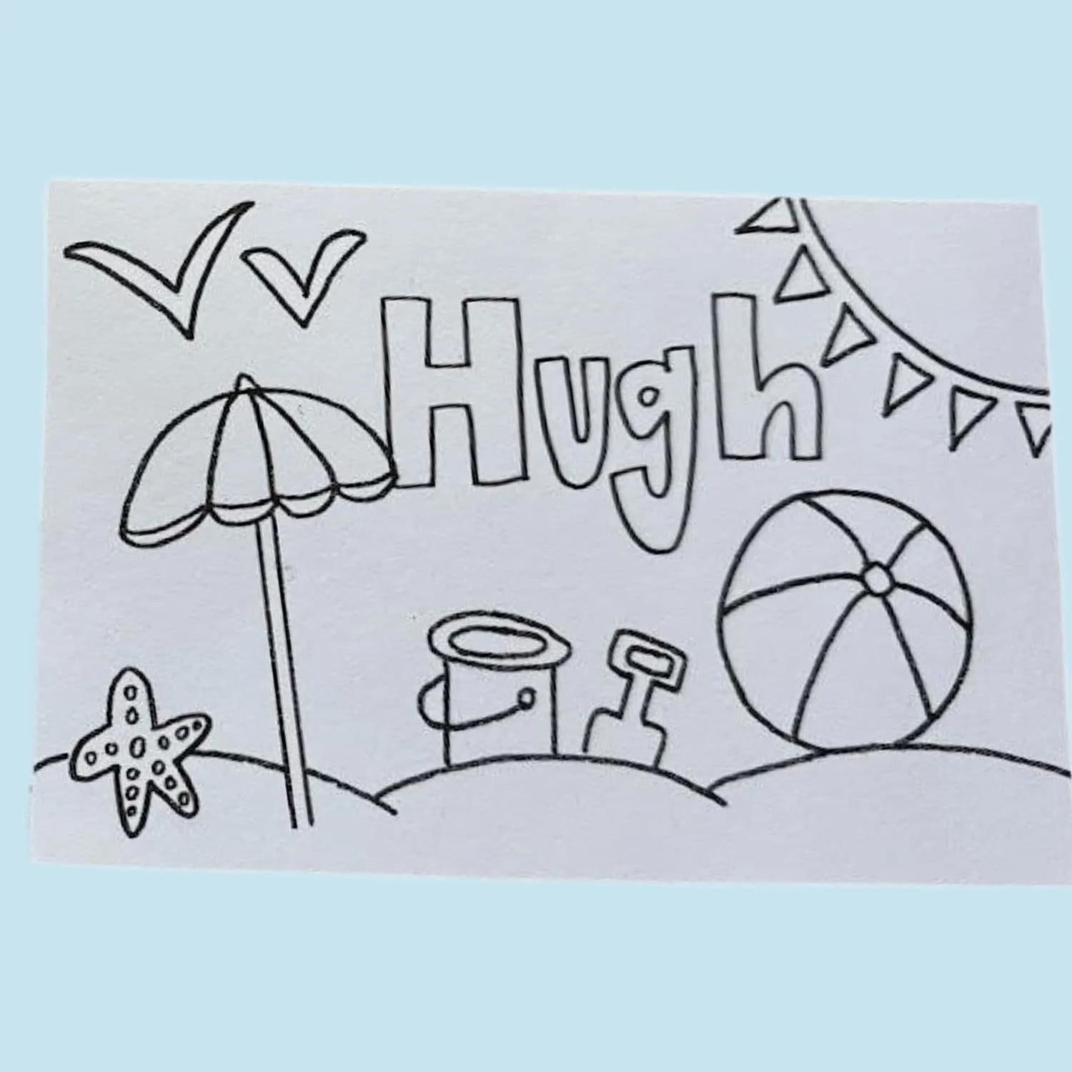 A black and white custom coloring page of a beach scene with a large umbrella, a beach ball, a starfish, a bucket, and a shovel, with the word 'Hugh' in the center and bunting decorations.
