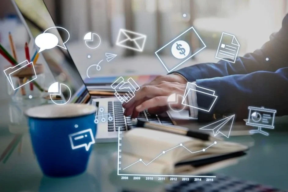 Person using a laptop with digital icons representing email, money, documents, speech bubbles, and data charts floating around.